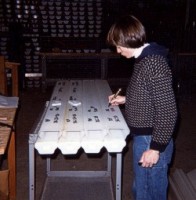 Sally Needell (USGS) packaging and labeling the "working" and "archive" halves of each core in preparation for photographing and storage at the WHOI core lab.