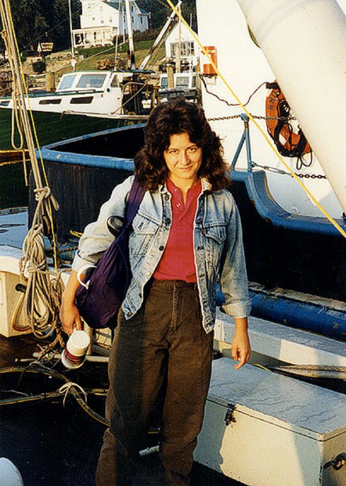 Mary DiGiacomo-Cohen (State Geological and Natural History Survey of Connecticut) preparing to "go to sea" on the RV ASTERIAS cruise AST 90-1, Noank, CT. The stern of the RV UCONN is visible behind Mary.