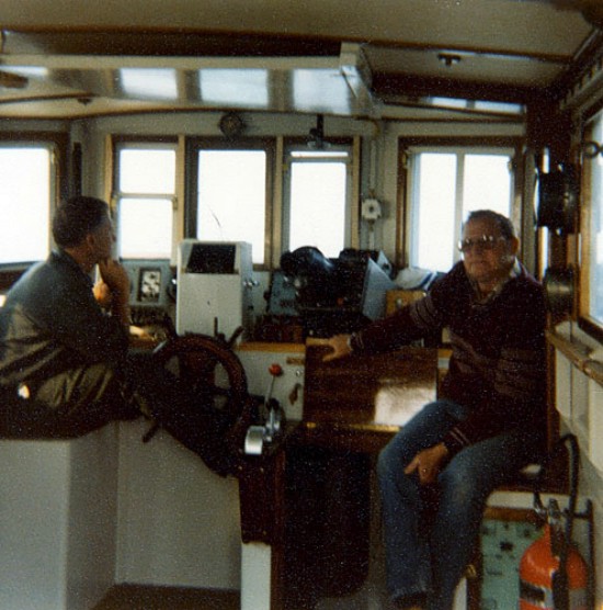 Captain Colburn (WHOI) with Frank Jennings (USGS) in the wheelhouse of the RV Asterias during cruise AST 81-2.