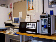 Photograph of a Coulter Counter Multisizer IIe and its associated computer hardware.