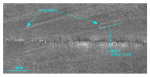 Figure 25.  Detailed planar view of a comet structure associated with a boulder from the sidescan-sonar mosaic produced during NOAA survey H11079.  Higher backscatter within this feature shows that coarser grained sediment is present there; scour asymmetry indicates that net transport is to the northeast.  Location of view is shown in figure 22. 