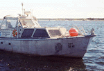 Figure 6. Starboard-side view of National Oceanic and Atmospheric Administration (NOAA) Launch 1014 afloat. This hydrographic vessel was deployed from the NOAA Ship Whiting. 